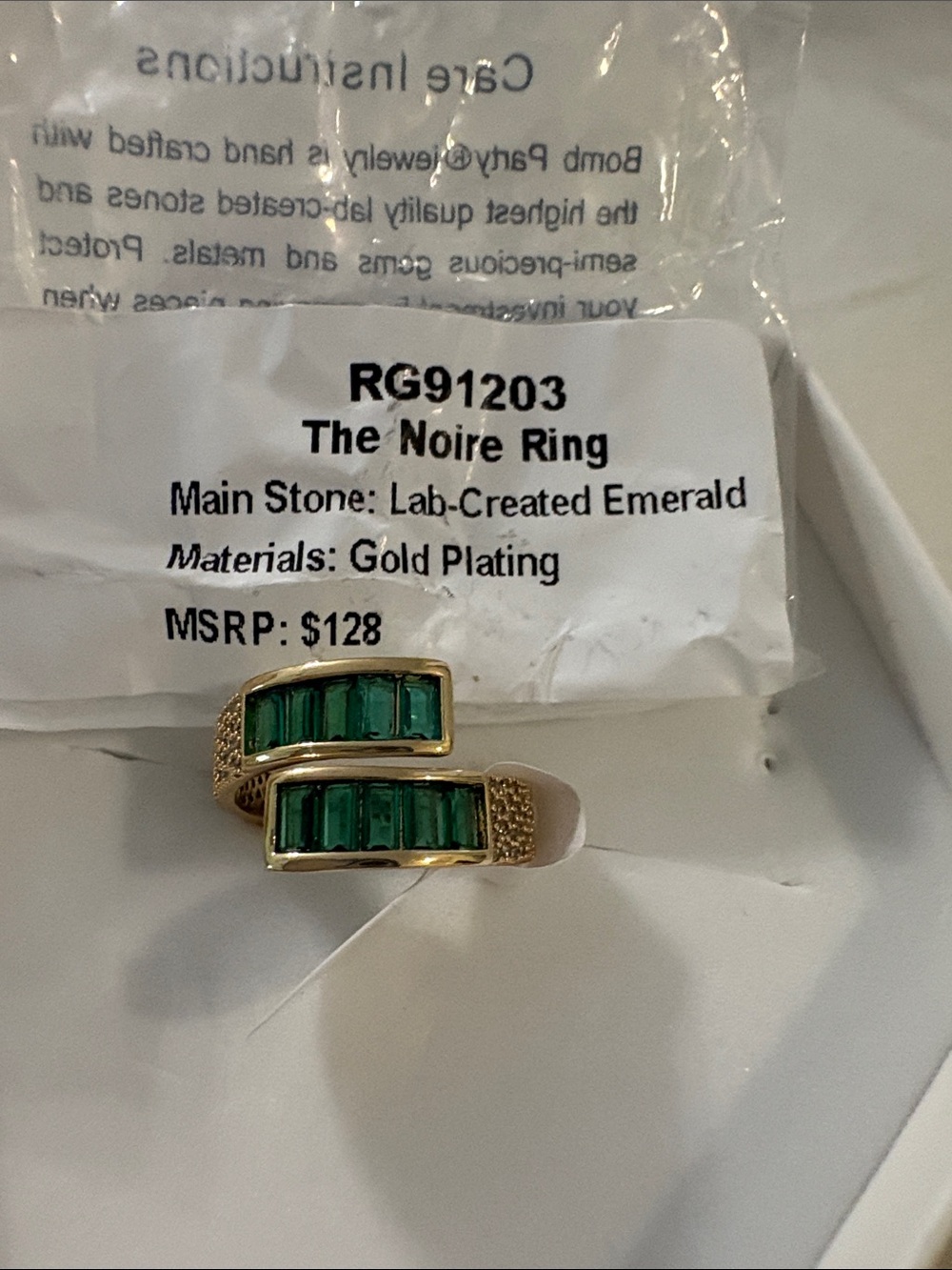 nOir Jewelry Gold-Plated Ring with Green Baguette Stones